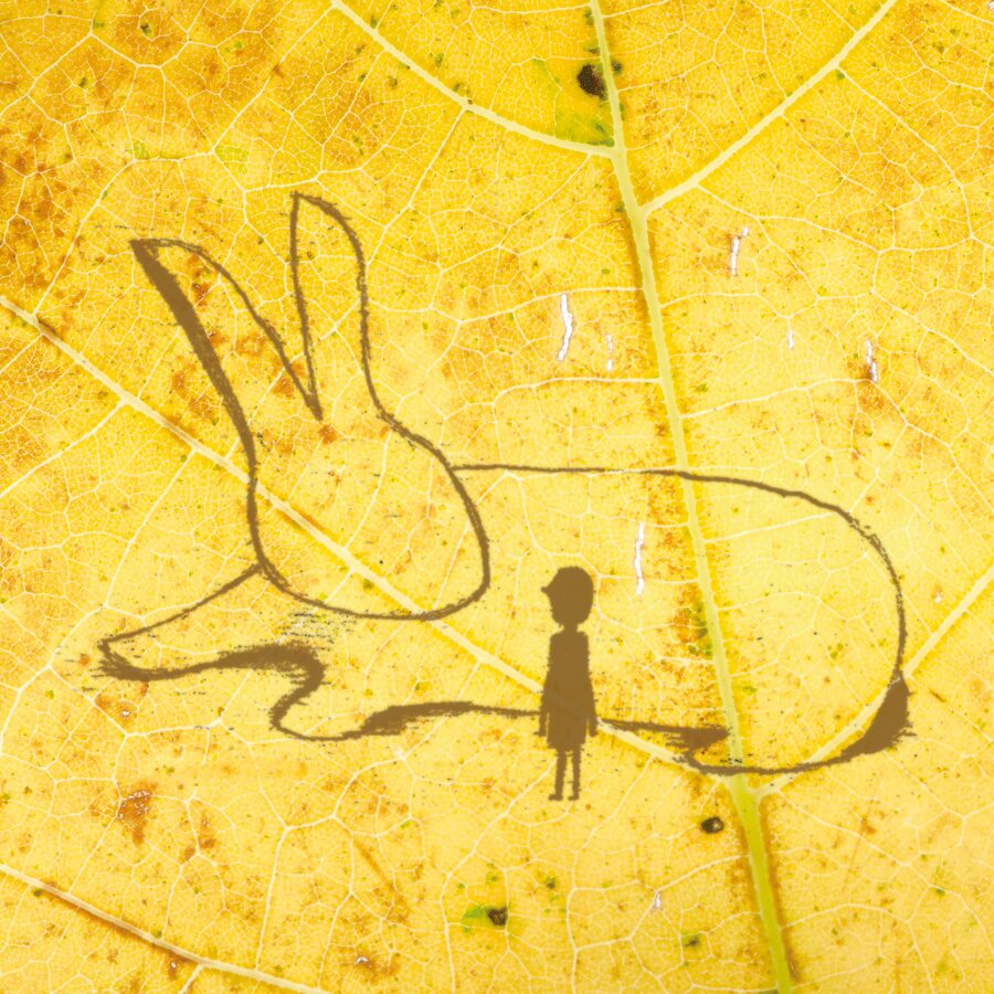 Album back cover: the same leaf with a hand-drawn rabbit and a small figure silhouette
