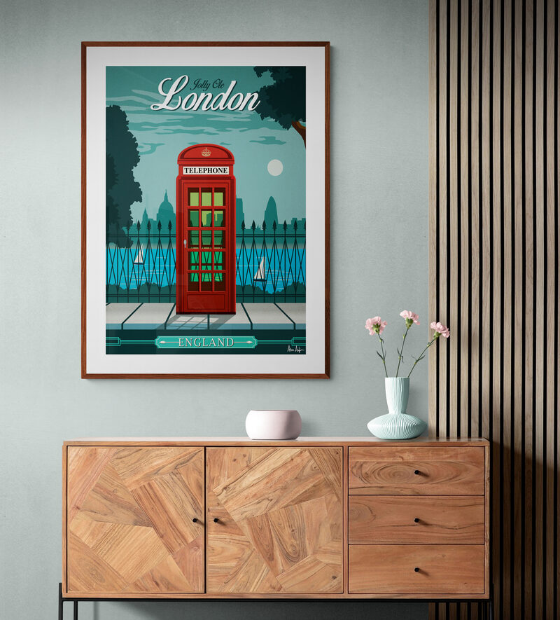 London travel print in a walnut frame above a wooden sideboard