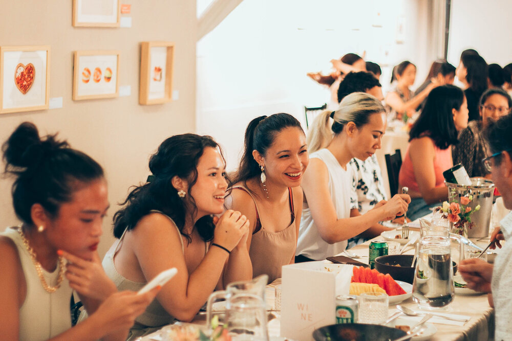Guests at an artist open house at THE STUDIO