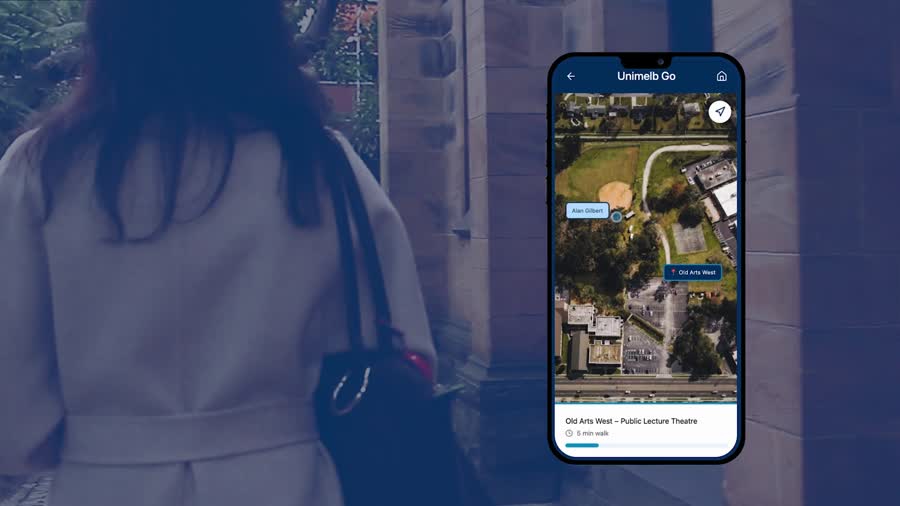 Film frame showing the app's map view finding Old Arts West Public Lecture Theatre, held over a shot of the student walking